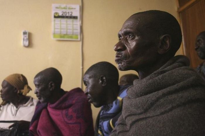 Former Lesotho gold miner Moteaphala Molapho, 73, sits in a district office in Semongkong, 120 km (75 miles) east of the capital Maseru January 12, 2012. REUTERS/Ed Cropley