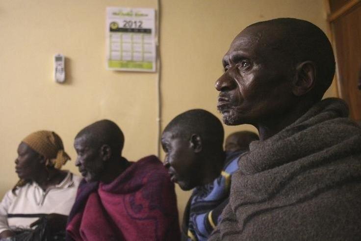 Former Lesotho gold miner Moteaphala Molapho, 73, sits in a district office in Semongkong, 120 km (75 miles) east of the capital Maseru January 12, 2012. REUTERS/Ed Cropley