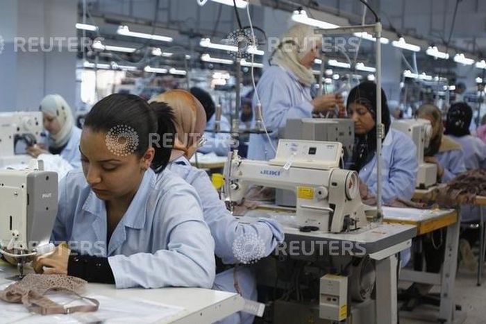 Tunisian Employees work at an underwear factory in Sfax, 260 km (162 miles) south of Tunisia March 22, 2012. REUTERS/Zoubeir Souissi