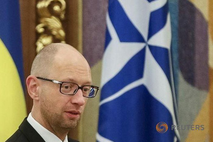 Ukraine PM accuses Russian forces of shooting down flight MH17