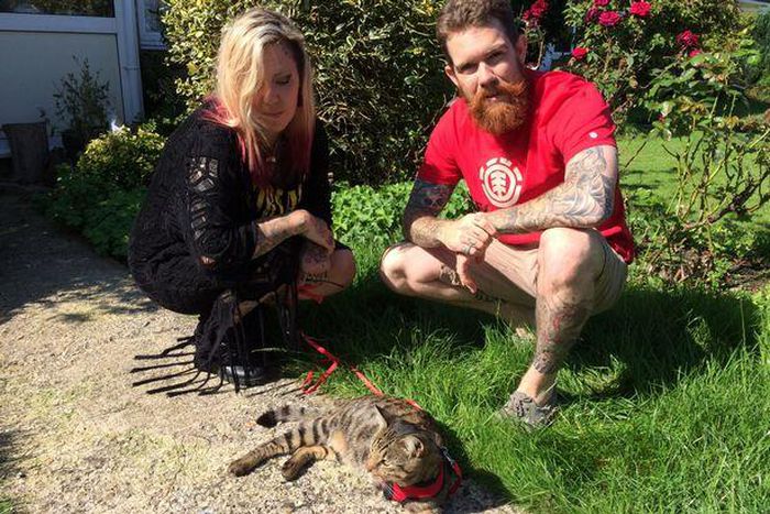 Leah, 30, and Allen Elphick, 28, with their cat Arnold