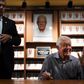 Former President Jimmy Carter waves to the crowd as he signs his new book titled A Full Life: Reflections at 90.
