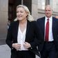 Marine Le Pen (L), the leader of France's far-right National Front party, walks after leaving the building of the State Duma, the lower house of parliament, in central Moscow, Russia, May 26, 2015. REUTERS/Maxim Zmeyev