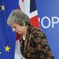 British Prime Minister Theresa May is struggling to find ways to get MPs to back her unpopular divorce deal