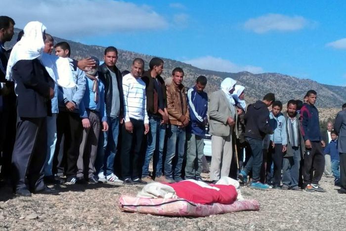Tunisians pray before the burial of 17-year-old shepherd Mabrouk Soltani, who was slaughtered and beheaded by jihadists on November 13, 2015 during his funeral in Jelma, a town in Tunisia's central governorate of Sidi Bouzid on November 15, 2015