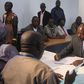 Burundian President Pierre Nkurunziza (seated, C) registers to run for a third five-year term in office, in the capital Bujumbura, May 8, 2015.  REUTERS/Jean Pierre Aime Harerimana