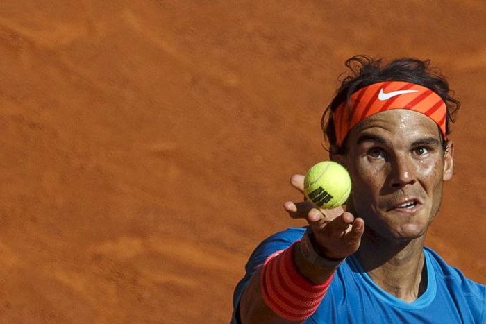 Spain's Rafael Nadal serves to Czech Republic's Tomas Berdych during their semi-final match at the Madrid Open tennis tournament in Madrid, Spain, May 9, 2015. REUTERS/Sergio Perez