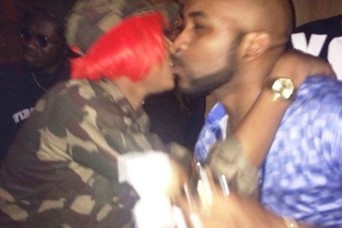 Banky W and Cynthia Morgan exchanging pleasantries in what looks like a soft 'kiss'