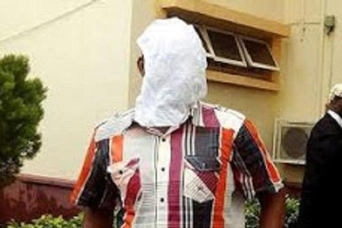 Emmanuel Osita walking to prison