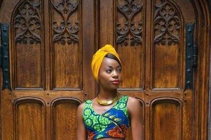 Ankara crop top over pencil skirt with slit details