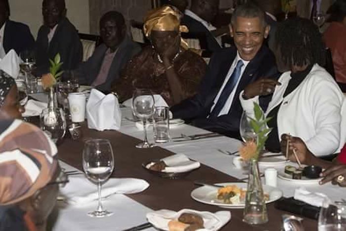 Obama flanked by half sister, Auma Obama and grand mum.