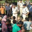 Some police officers and the arrested suspects