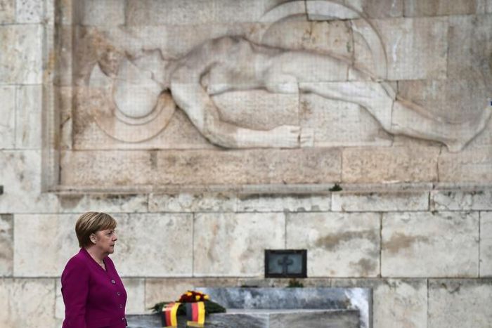 German Chancellor Angela Merkel pays tribute at the Tomb of the Unknown Soldier in Athens on January 11, 2019