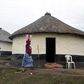 A woman carries a bucket of water outside Mthata, in South Africa's Eastern Cape province, September 8, 2012. REUTERS/Siphiwe Sibeko