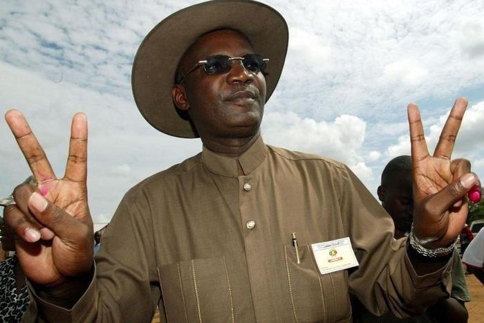 Former Minister of Information Jonathan Moyo makes a victory signs after casting his vote in a file photo. REUTERS/Juda Ngwenya