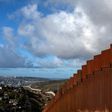 A section of the steel wall on the US - Mexico border near San Diego, California