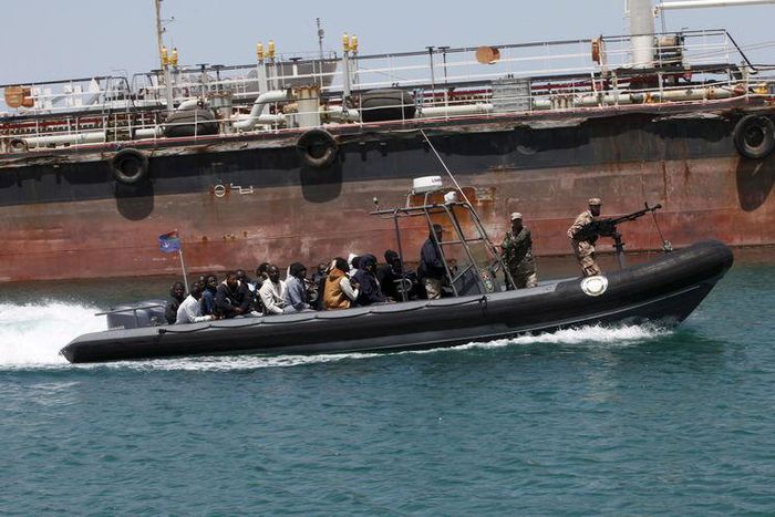 Libyan Navy boat carries illegal migrants who attempted to flee the coast to Europe back to the coastal city of Tripoli May 5, 2015. REUTERS/Ismail Zitouny