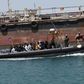 Libyan Navy boat carries illegal migrants who attempted to flee the coast to Europe back to the coastal city of Tripoli May 5, 2015. REUTERS/Ismail Zitouny