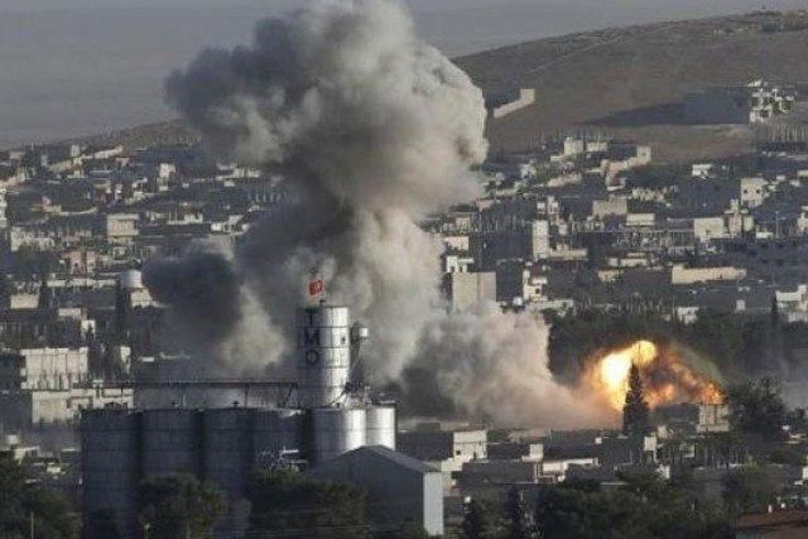 At least 12 killed as Syrian jet crashes into market