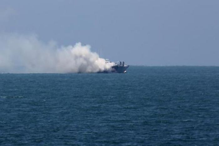 Militants clash with Egyptian coastguard, setting boat on fire