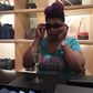 Laide Bakare try on an eye wear at Louis Vouitton store while sipping on an expensive champagne as a customer