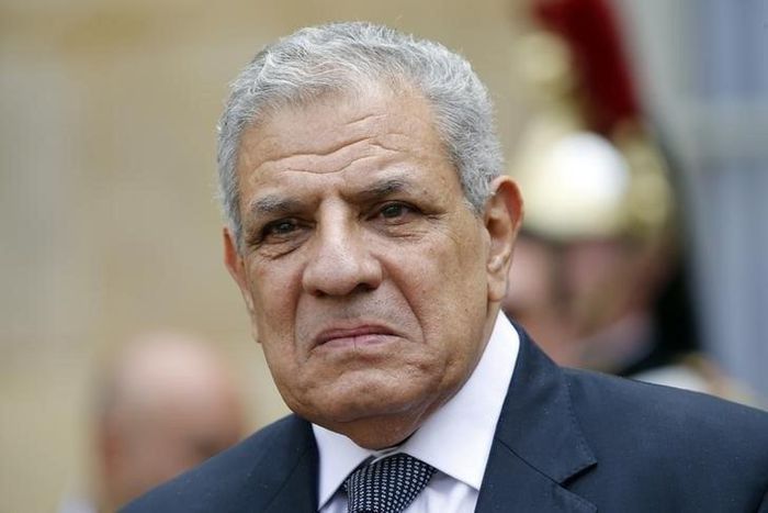 Egyptian Prime Minister Ibrahim Mehleb leaves after a meeting at the Hotel Matignon in Paris, France, May 13, 2015.   REUTERS/Charles Platiau