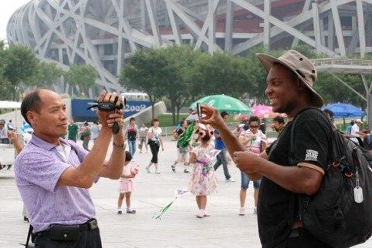 ___3842289___https:______static.pulse.com.gh___webservice___escenic___binary___3842289___2015___6___8___18___davis-china-tourist-2-480x321