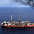 A ship loads crude oil at Bonga off-shore oil field outside Lagos, file photo. REUTERS/Akintunde Akinleye
