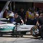 Mechanics push the car into the box of Mercedes F1 driver Nico Rosberg of Germany during the qualifying session of the Spanish Grand Prix at the Circuit de Barcelona-Catalunya racetrack in Montmelo, near Barcelona, Spain, May 9, 2015. REUTERS/Juan Medi...