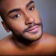 Guy wears makeup