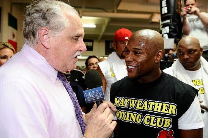 Al Bernstein talking to Floyd Mayweather Jr. before a bout