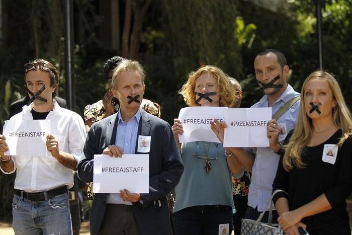 Kenya-based foreign journalists demonstrate against the imprisonment of three Al Jazeera journalists in Egypt, at the United Nations Environment programme (UNEP) headquarters in Nairobi January 13, 2015, as a reception by Egypt's Foreign Minister Sameh...
