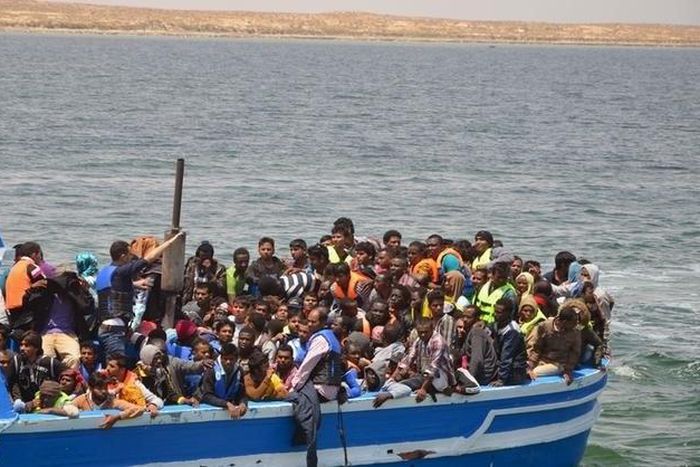 Illegal migrants seen on a boat after being rescued by the Tunisian navy off the coast near Ben Guerdane, Tunisia, June 10, 2015. REUTERS/Stringer