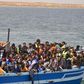 Illegal migrants seen on a boat after being rescued by the Tunisian navy off the coast near Ben Guerdane, Tunisia, June 10, 2015. REUTERS/Stringer
