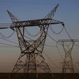 Electricity pylons are seen in front of the Kendal Power Station, a coal-fired power station in Witbank, in the Mpumalanga province November 9, 2011. REUTERS/Siphiwe Sibeko