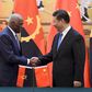 Angola's President Jose Eduardo dos Santos (L) shakes hands with China's President Xi Jinping during a signing ceremony at the Great Hall of the People in Beijing, June 9, 2015. REUTERS/Wang Zhao/Pool