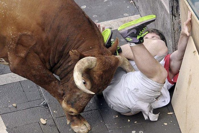Three men gored as Spain's San Fermin bull-running week begins