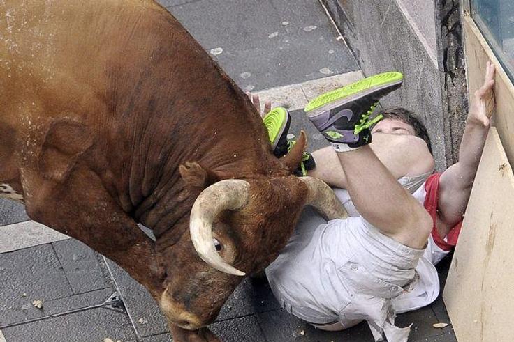 Three men gored as Spain's San Fermin bull-running week begins