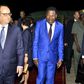 French President Francois Hollande (L) walks with Benin President Thomas Yayi Boni after landing in Cotonou, Benin, July 2, 2015. REUTERS/Charles Placide Tossou