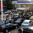 Car owners queuing at a petrol station in Nigeria