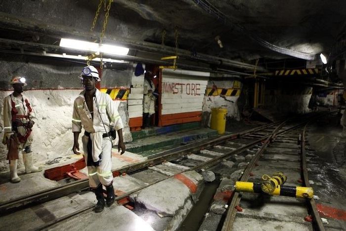 Miners are seen underground at Lonmin Plc's Karee mine in Marikana, Rustenburg 100 km (62 miles) northwest of Johannesburg, in a file photo. REUTERS/Siphiwe Sibeko