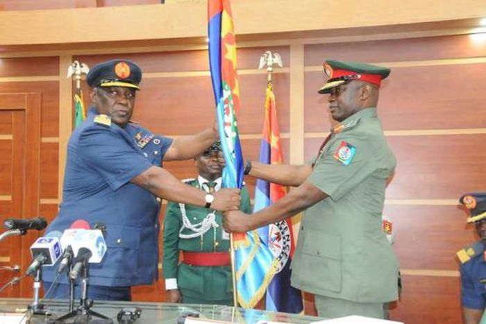 Former Chief of Defence Staff, Air Chief Marshall Alex Badeh hands over to successor, Major General Abayomi Gabriel Olonishakin on July 21, 2015.
