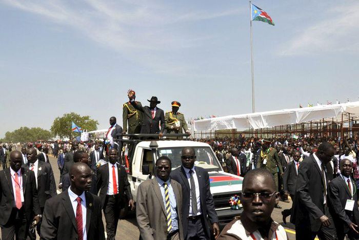 South Sudan's President Salva Kiir waves to the crowd atop a truck as he arrives at John Garang's Mausoleum to celebrate the 4th Independence Day in the capital Juba July 9, 2015. REUTERS/Jok Solomoun