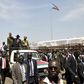 South Sudan's President Salva Kiir waves to the crowd atop a truck as he arrives at John Garang's Mausoleum to celebrate the 4th Independence Day in the capital Juba July 9, 2015. REUTERS/Jok Solomoun