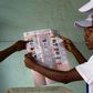 Members of the Burundian National Independent Electoral Commission count votes for the parliamentary elections at a polling station near Musaga neighbourhood in capital Bujumbura, June 29, 2015. REUTERS/Paulo Nunes dos Santos