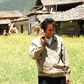 A Chines man making a phone call.
