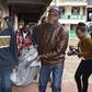 The bodies of the victims being carried out of what remains of the dormitory