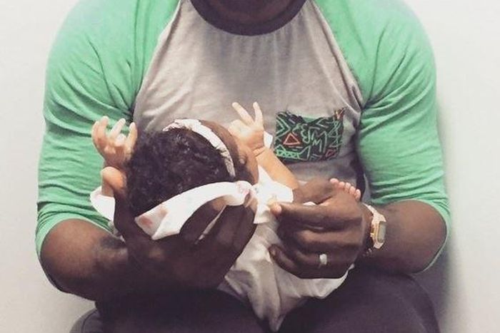 Neptune's first picture with his daughter