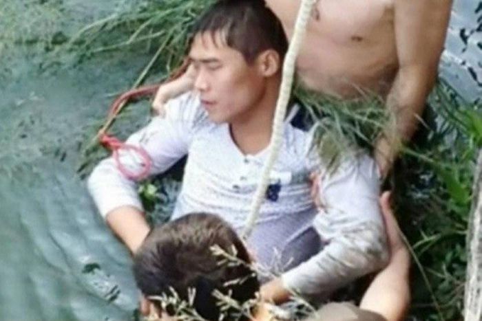 He was found lying face down in a river