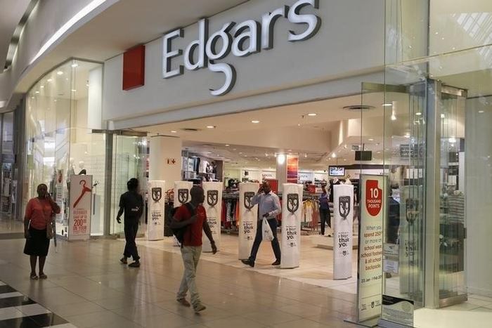 Shoppers walk past an Edgars store at a shopping centre in Soweto, southwest of Johannesburg, January 30, 2015.   REUTERS/Siphiwe Sibeko